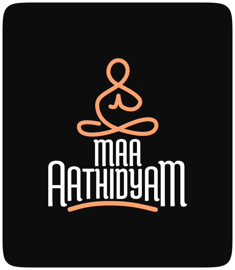 Maa Aathidyam white and orange logo on black