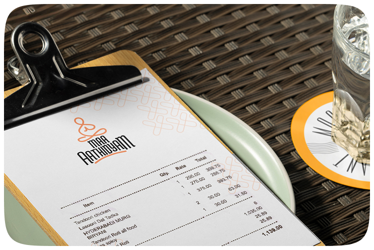 Maa Aathidyam bill on a clipboard